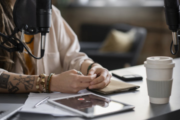 Woman making podcast studio